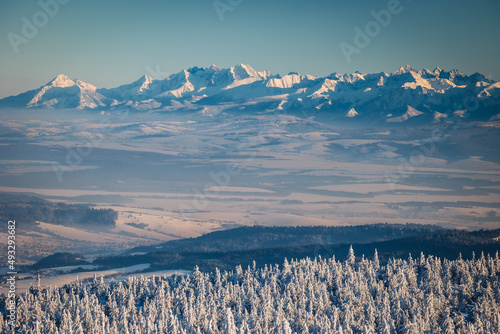 Fototapeta Naklejka Na Ścianę i Meble -  A frosty winter morning in Beskid Żywiecki. Views of the Tatra Mountains and Mala Fatra.