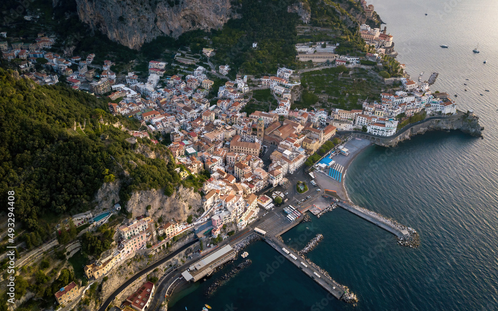 Small seaside town on a sunrise (aerial drone photo). Mediterranean, Amalfi, Italy