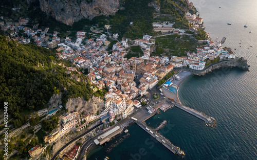 Small seaside town on a sunrise (aerial drone photo). Mediterranean, Amalfi, Italy