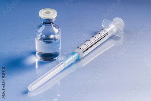 Syringes placed on a blue background. medicine Concept