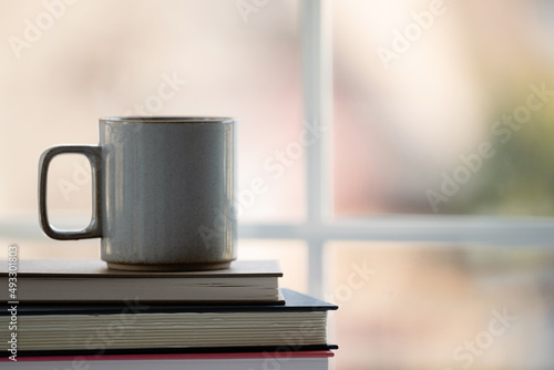 Coffee mug by the window
