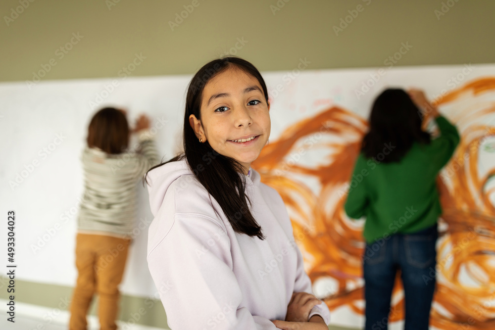 Girl at painting studio with friends portrait Girl at painting studio with friends portrait