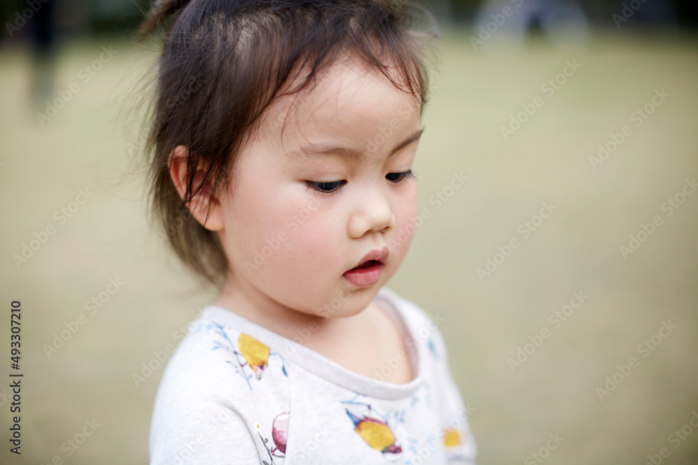 Cute asian little girl outdoors Cute asian little girl outdoors