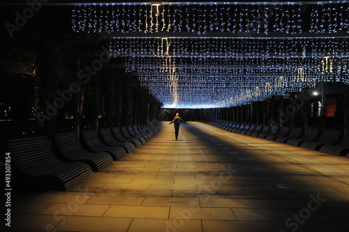 Alley with Christmas illumination photo