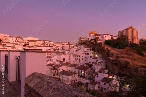 Panoramic view of the beautiful and famous white village of Setenil de las Bodegas from a viewpoint at sunrise, Cadiz province, Andalusia, Spain