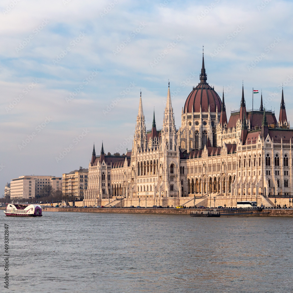 view from the Danube river to the beautiful Gothic building of the Hungarian Parliament as a symbol of the Hungarian capital view from the Danube river to the beautiful Gothic building of the Hungarian Parliament as a symbol of the Hungarian capital
