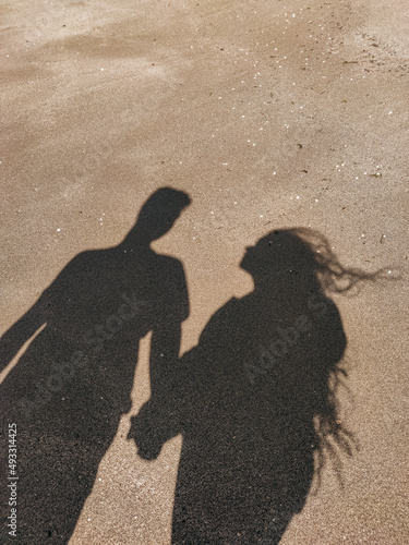 person walking on the beach
