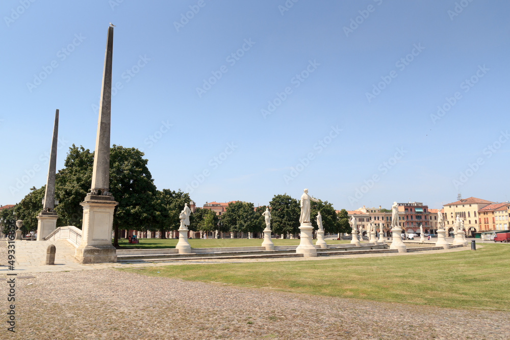 Large square Prato della Valle with obelisks and statues in Padua, Italy