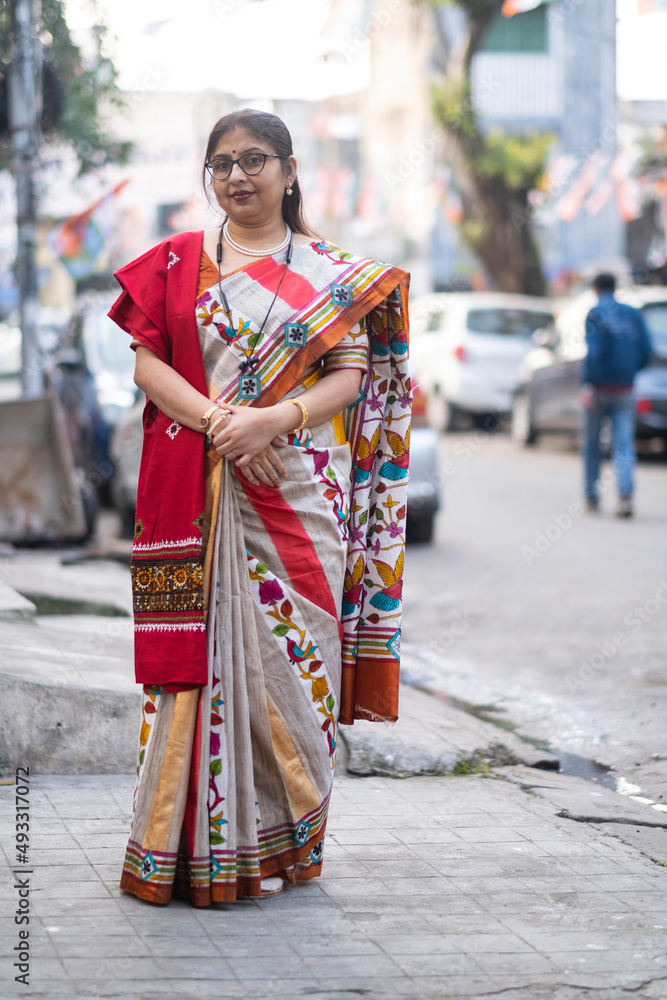 Middle Aged Woman Wearing Sari And Standing In Street Middle Aged Woman Wearing Sari And Standing In Street