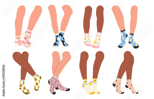 Female or male legs in stylish  socks set. Underwear with trendy, colorful prints. Footwear, cotton socks collection. Fashion accessories for everyday wearing. Isolated vector illustration