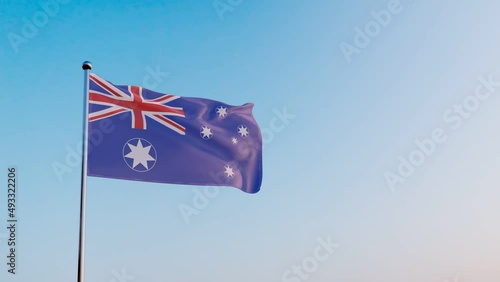 flag of Australia in the wind against the background of a dramatic sky