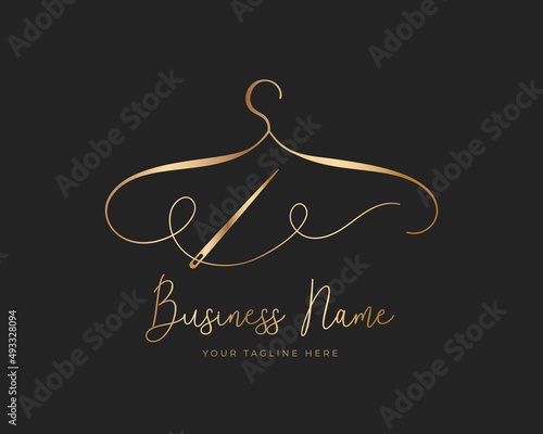 Hanger logo design with golden thread and needle