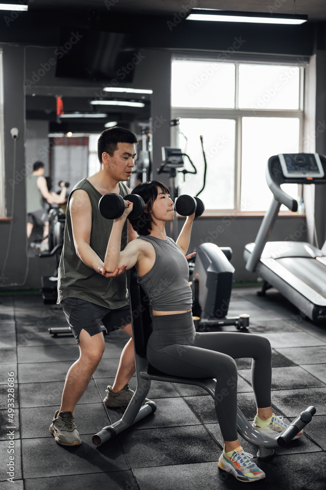 Young Asian couple exercising Young Asian couple exercising