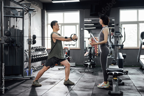 Wallpaper Mural Young Asian couple  exercising  Torontodigital.ca