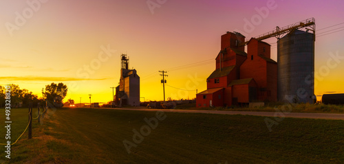 grain elevator in sunset photo