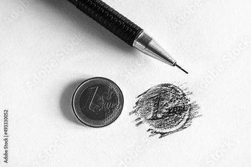 Retrace Euro coin with pencil photo