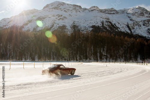 Vintage sports car on the frozen lake of St moritz