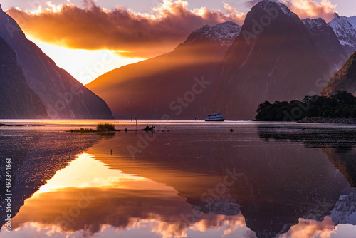 Milford Sound and Mitre Peak reflections during golden hour