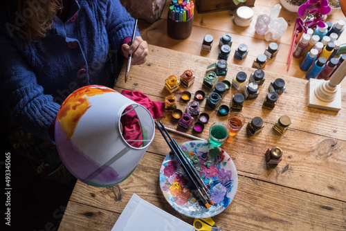 crafting, painting a lampshade 