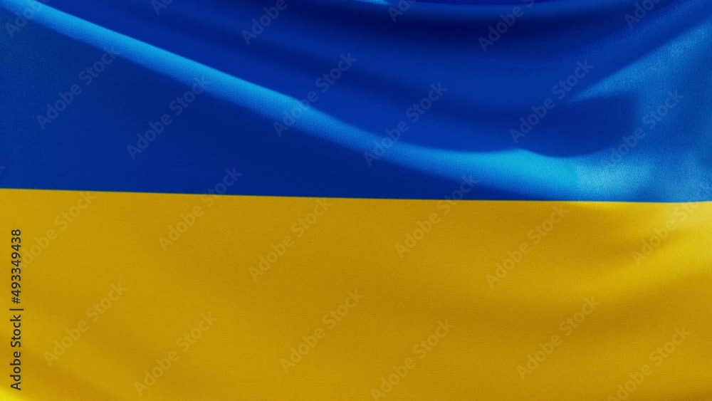 Windy day and waving colorful flag of Ukraine up close Windy day and waving colorful flag of Ukraine up close