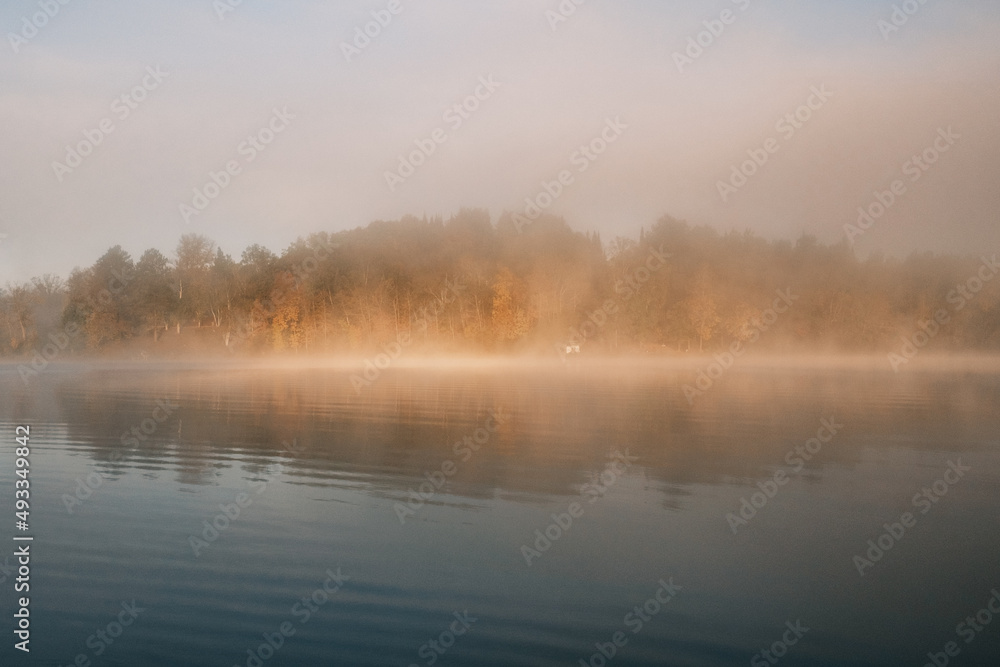 Sun shining through fog