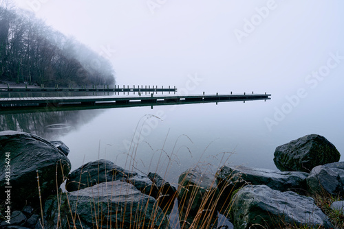 Lake Windermere in dense fog at dawn photo