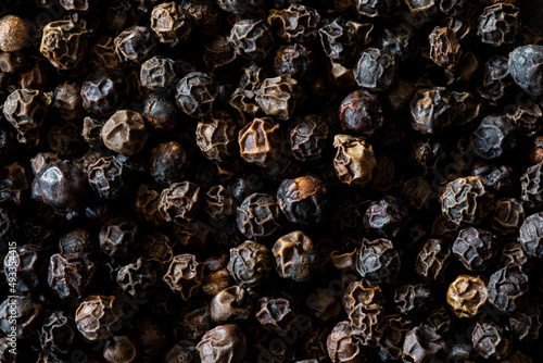 Food close up macro of black peppercorn spice.  photo