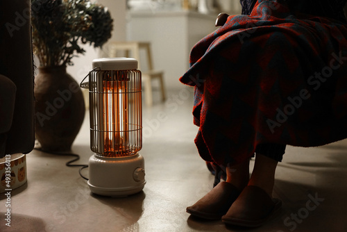 Closeup of heater in winter in cozy home environment photo