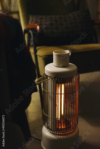 Closeup of heater in winter in cozy home environment photo