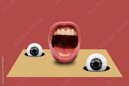Collage in surrealism style with two eyeballs and mouth photo