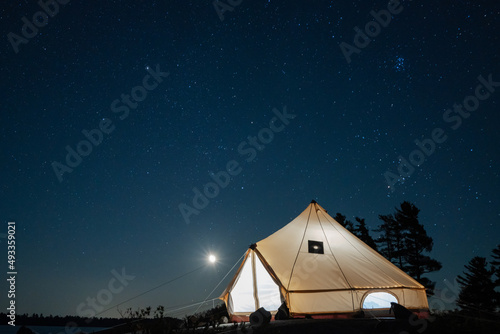 Canvas Tent With Night Sky on Wilderness Island photo