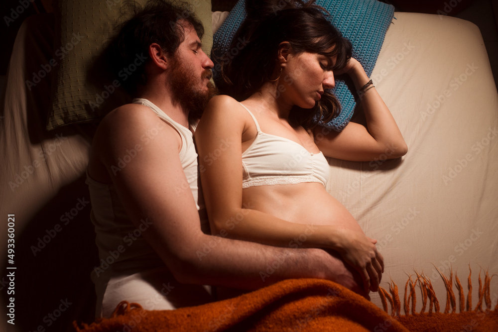 Couple resting during pregnancy Couple resting during pregnancy