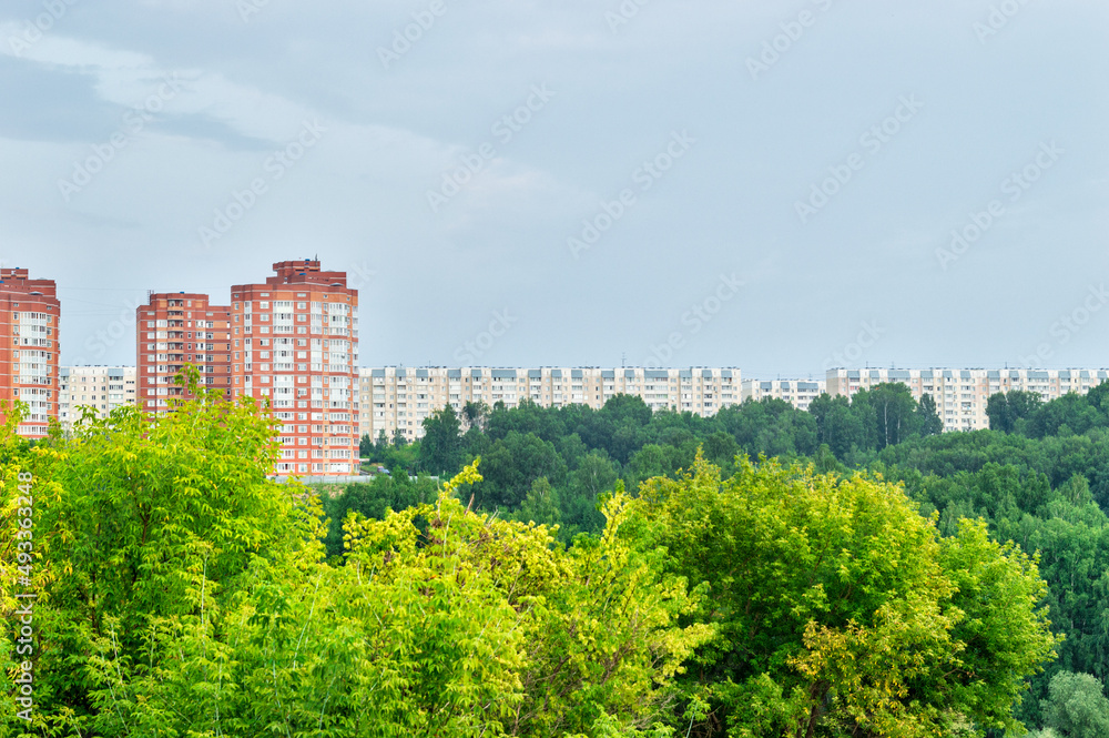 Residential area behind the forest