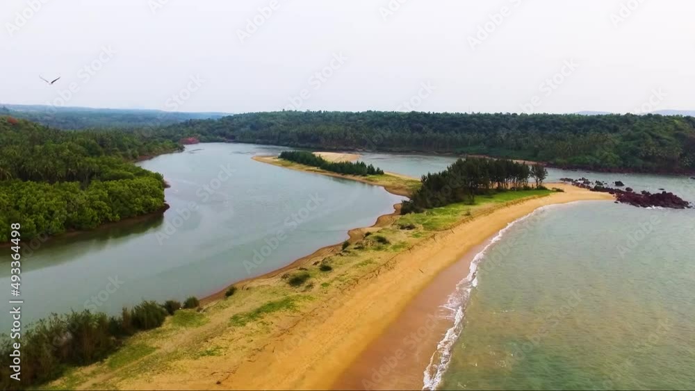 A drone view of beautiful river and beach of Galgibagh in south of Goa,India. A drone view of beautiful river and beach of Galgibagh in south of Goa,India.