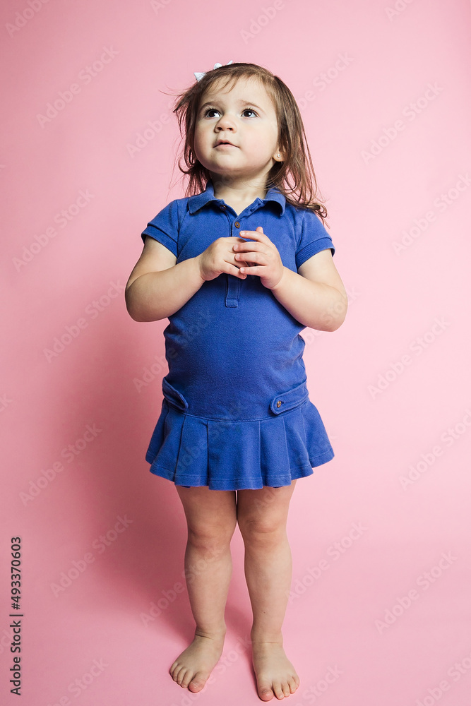 Little girl acting cute in studio Little girl acting cute in studio