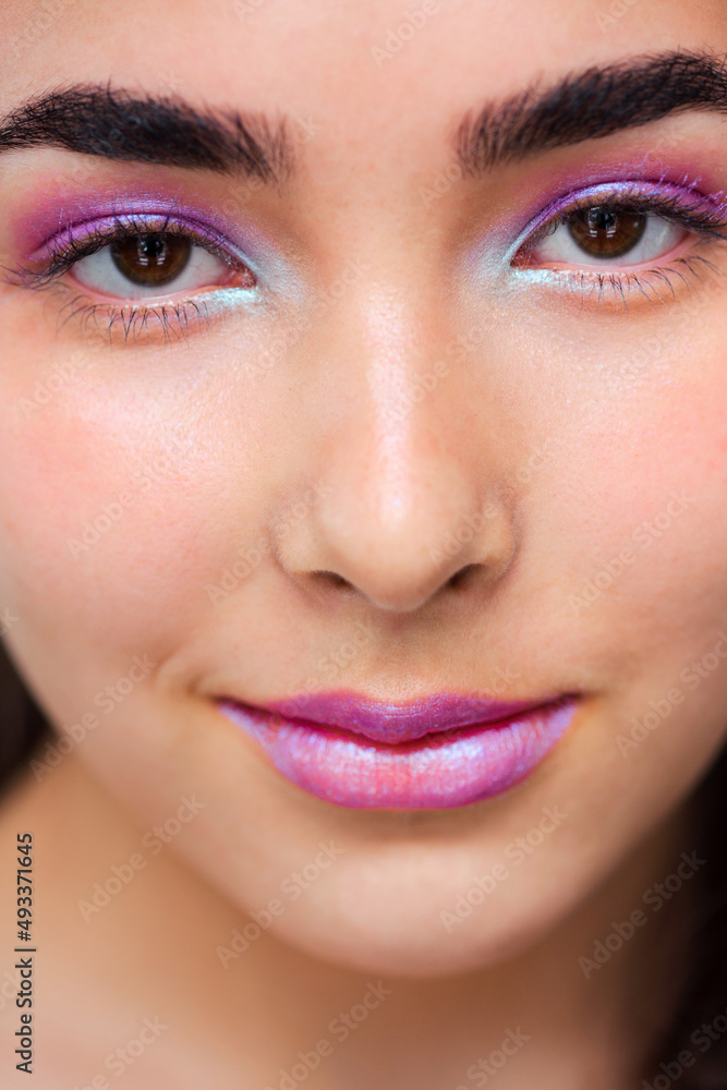 Portrait of a smiling young woman with fantasy make-up Portrait of a smiling young woman with fantasy make-up