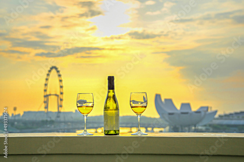 Photography Drink wine on the balcony.Marina Bay View.romantic dinner.