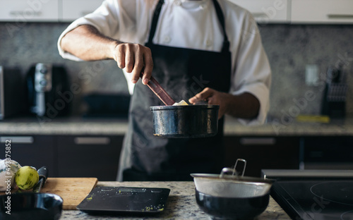 Pastry chef cooking in a kitchen