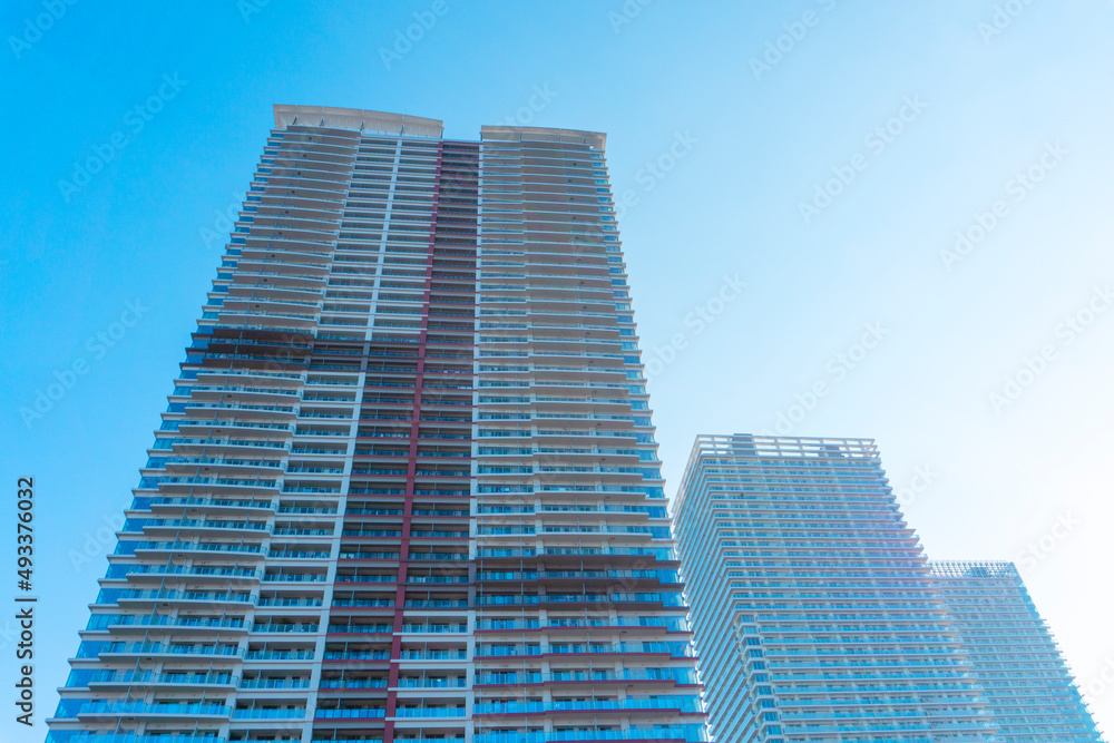 Landscape photograph looking up at a high-rise apartment_c_20 Landscape photograph looking up at a high-rise apartment_c_20