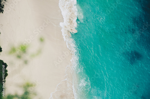 Beautiful white sand tropical beach view with blue sea water