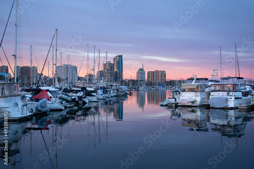 Marina in Long Beach, California, during beautiful sunset, boats and yachts on the water