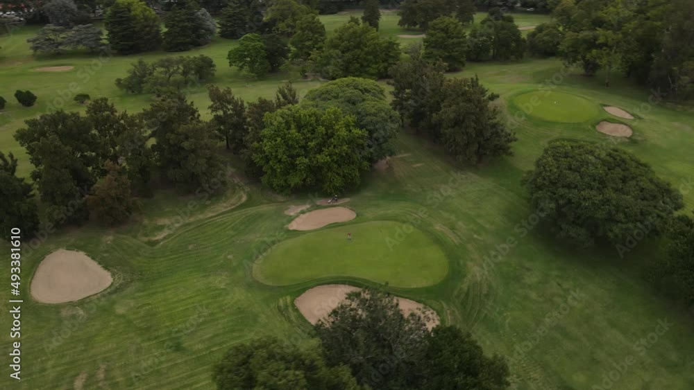 Golfer shot in Buenos aires Golf Club. Aerial 4K orbit shot Golfer shot in Buenos aires Golf Club. Aerial 4K orbit shot