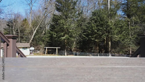 Wallpaper Mural A drone taking off (POV) from a deck in early spring. Torontodigital.ca