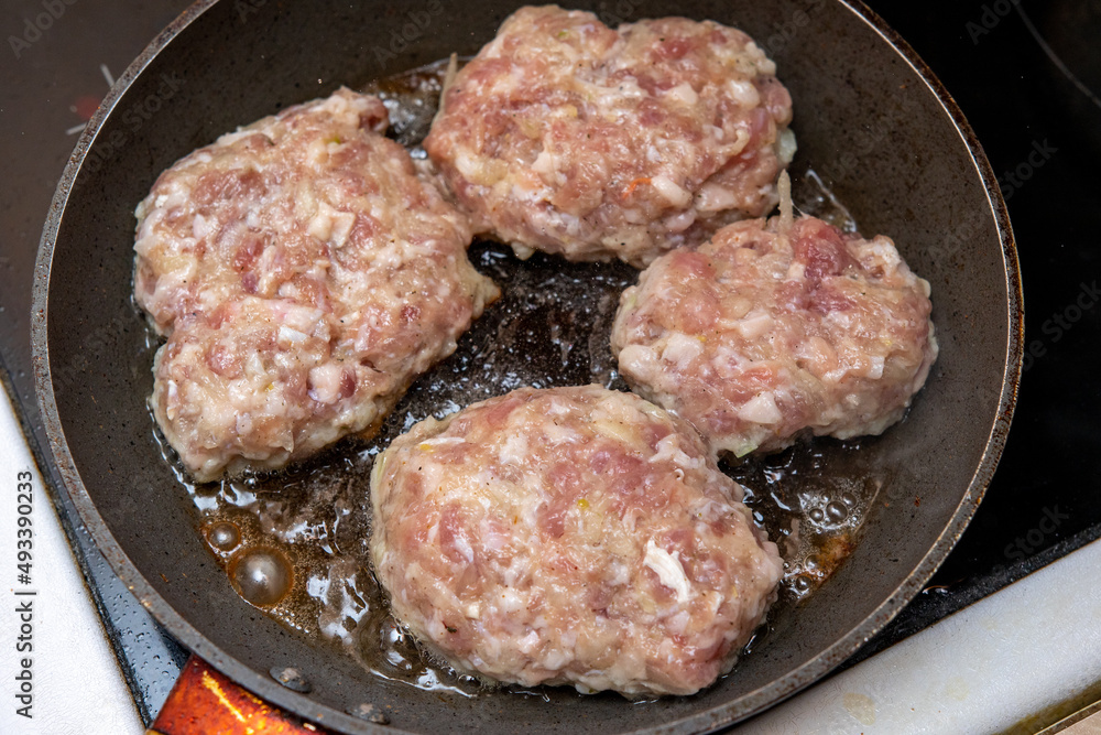 Meatballs are fried in a pan. Food. Meatballs are fried in a pan. Food.