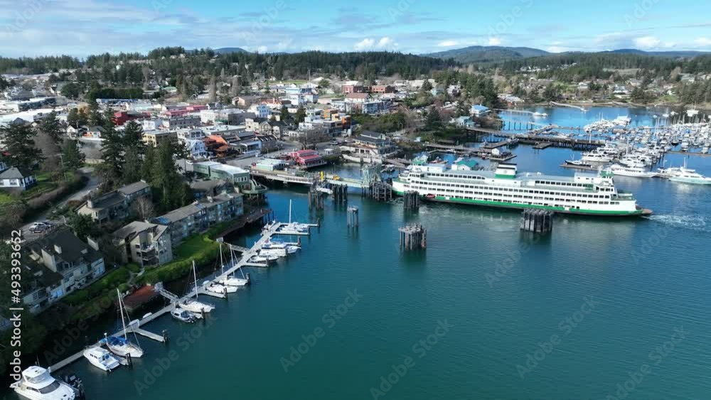Cinematic 4K aerial drone dolly shot of the Port and downtown of Friday Harbor with the ferry terminal in the San Juan Islands Cinematic 4K aerial drone dolly shot of the Port and downtown of Friday Harbor with the ferry terminal in the San Juan Islands