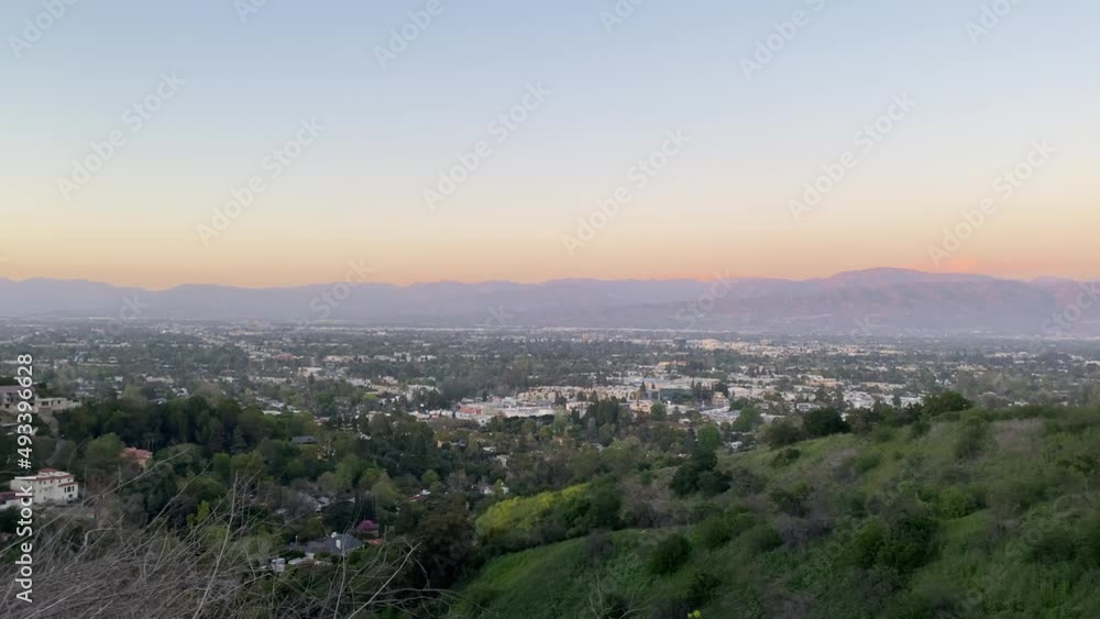 View from the top of the Betty B Dearing Mountain Trail, at sunset in Los Angeles, USA - Panning shot View from the top of the Betty B Dearing Mountain Trail, at sunset in Los Angeles, USA - Panning shot