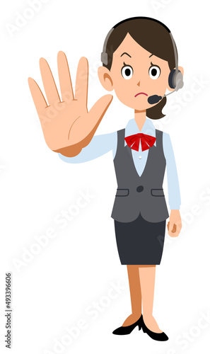 ヘッドセットを装着した制服着用の女性会社員が制止する
