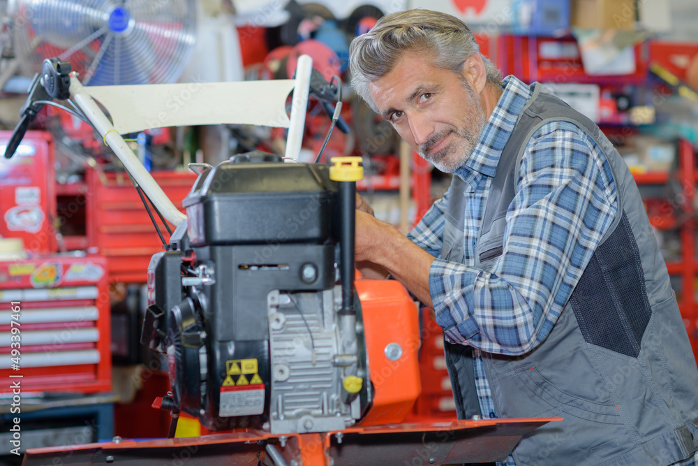 Fototapeta premium production machine operator looking at the camera