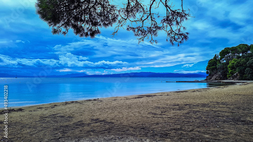 Blue ocean beach on the island of Skiathos, Greece. photo