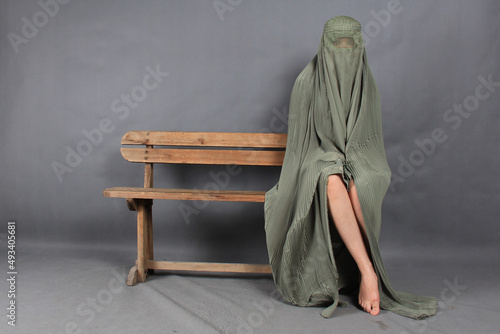 woman in a dress sitting on a chair
Afghan girl, Afghan woman, Afghan tent 